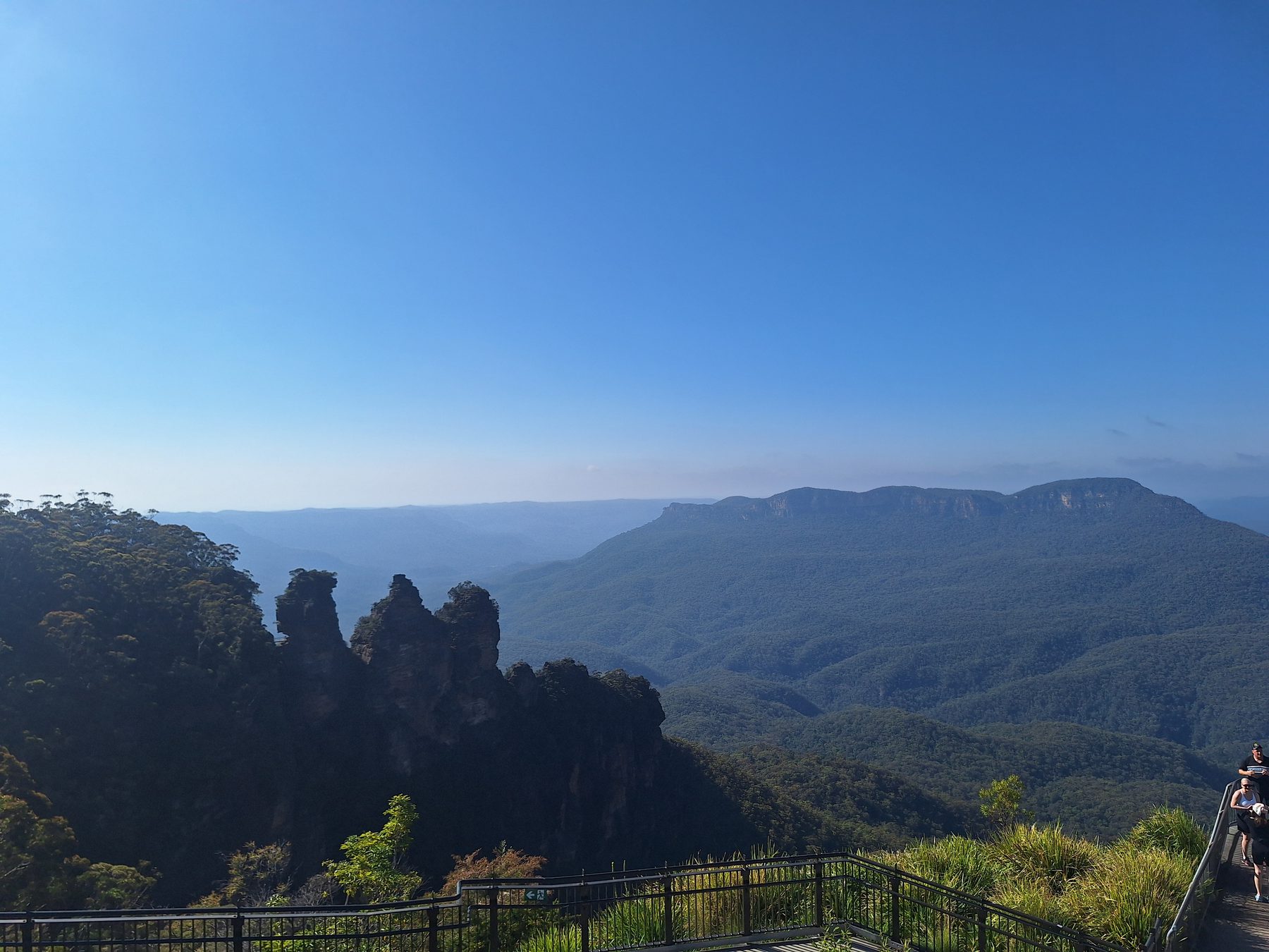 The Three Sisters rock formation above the forested Jamison Valley in the Blue Mountains
