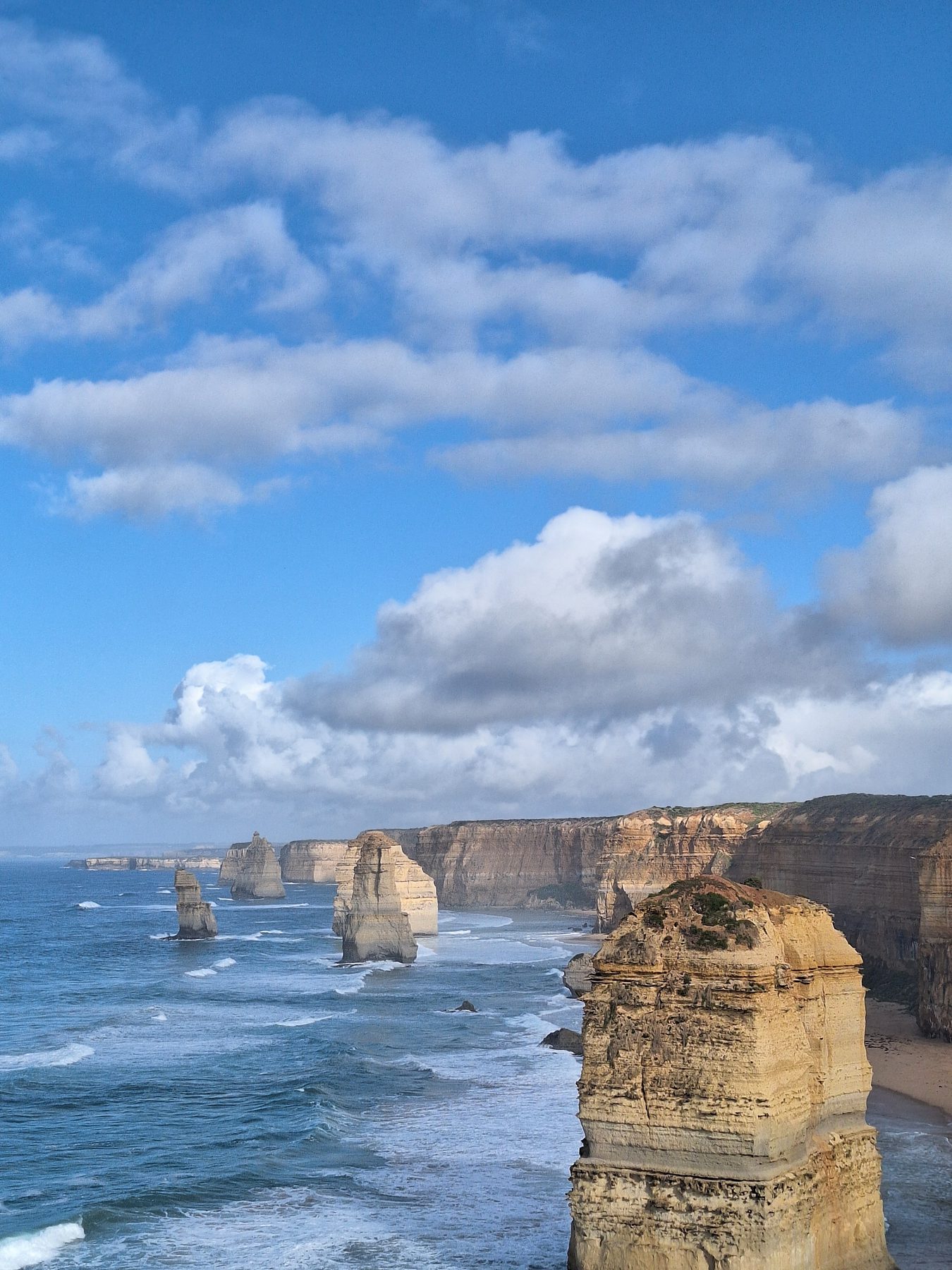 Limestone stacks of the Twelve Apostles standing in the sea off the Victorian coast