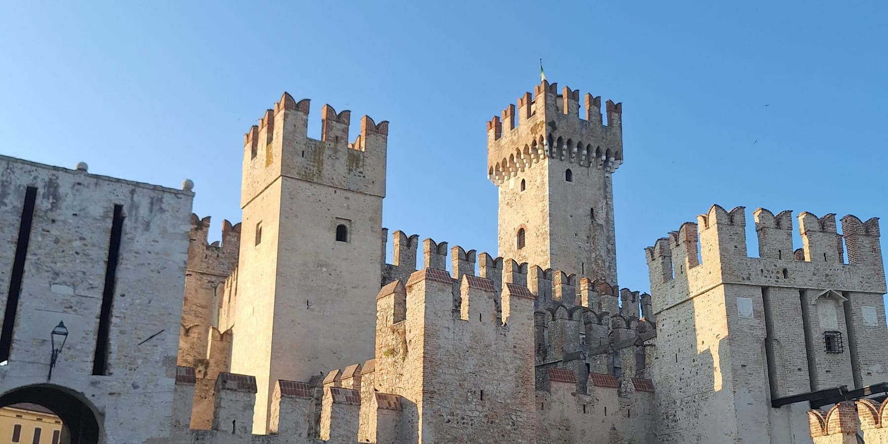 The crenellated towers of the Scaligero castle in Sirmione