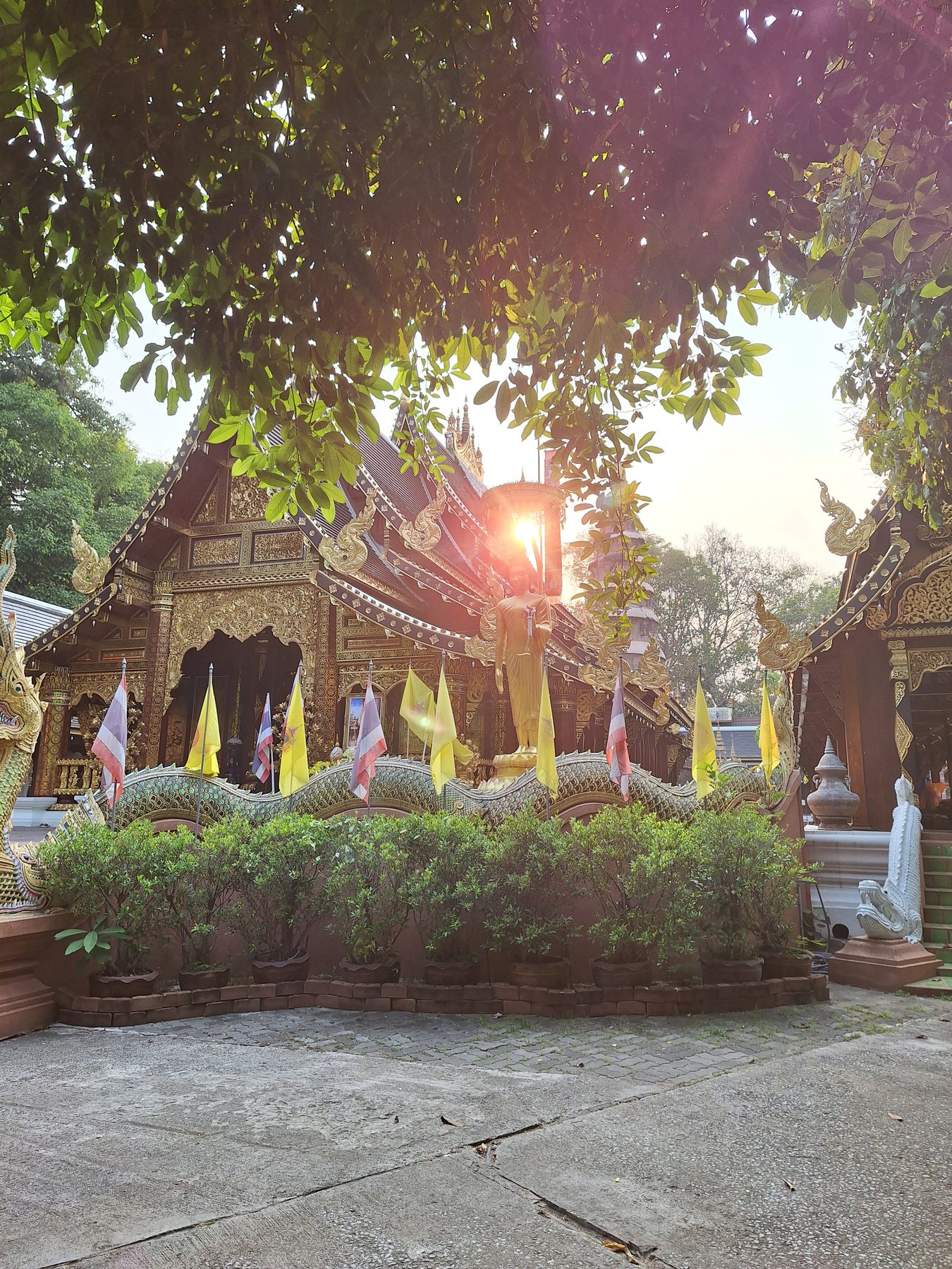 A Lanna temple lit by late afternoon sun in Chiang Mai, Thailand