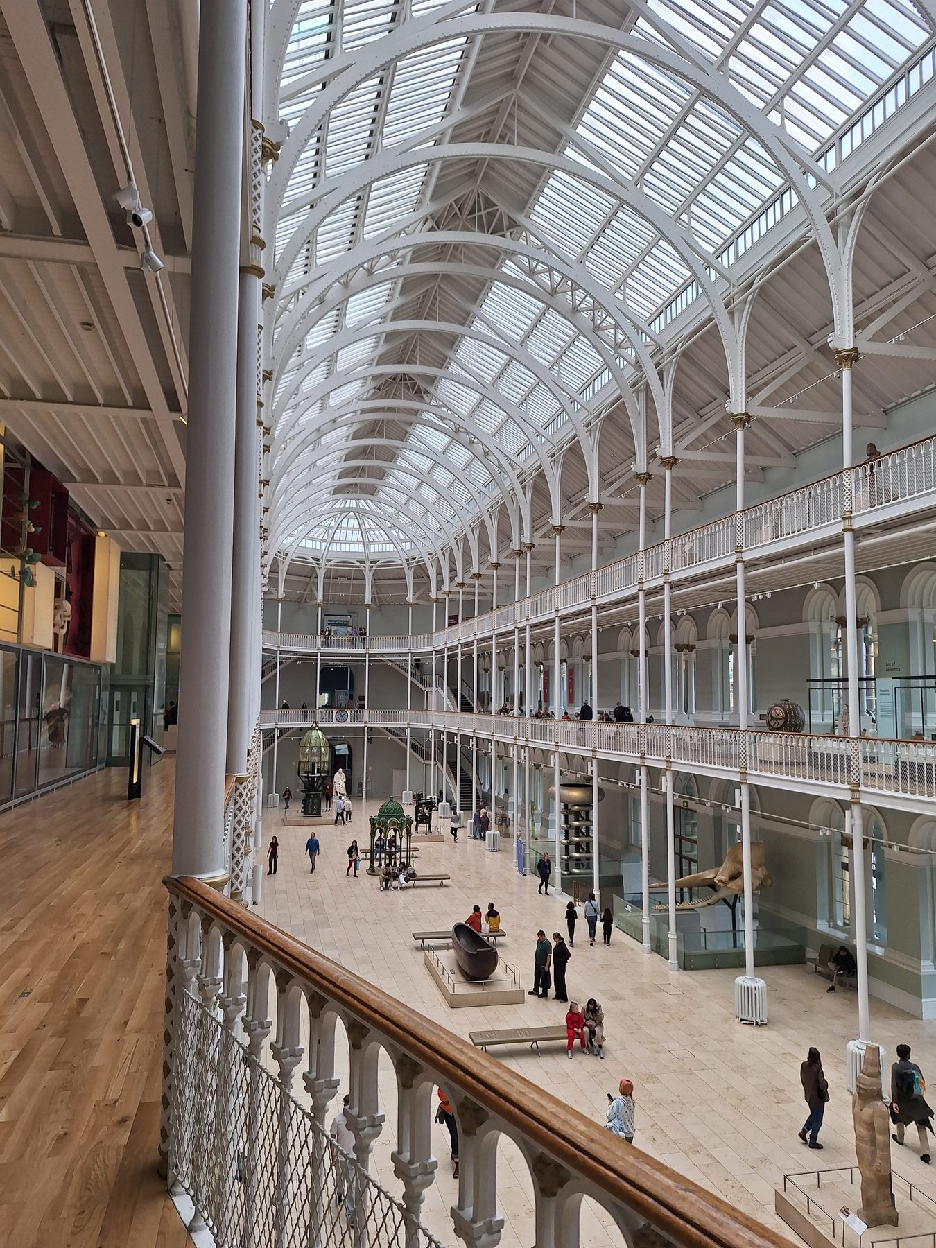 The white cast-iron galleries of the Grand Gallery at the National Museum of Scotland