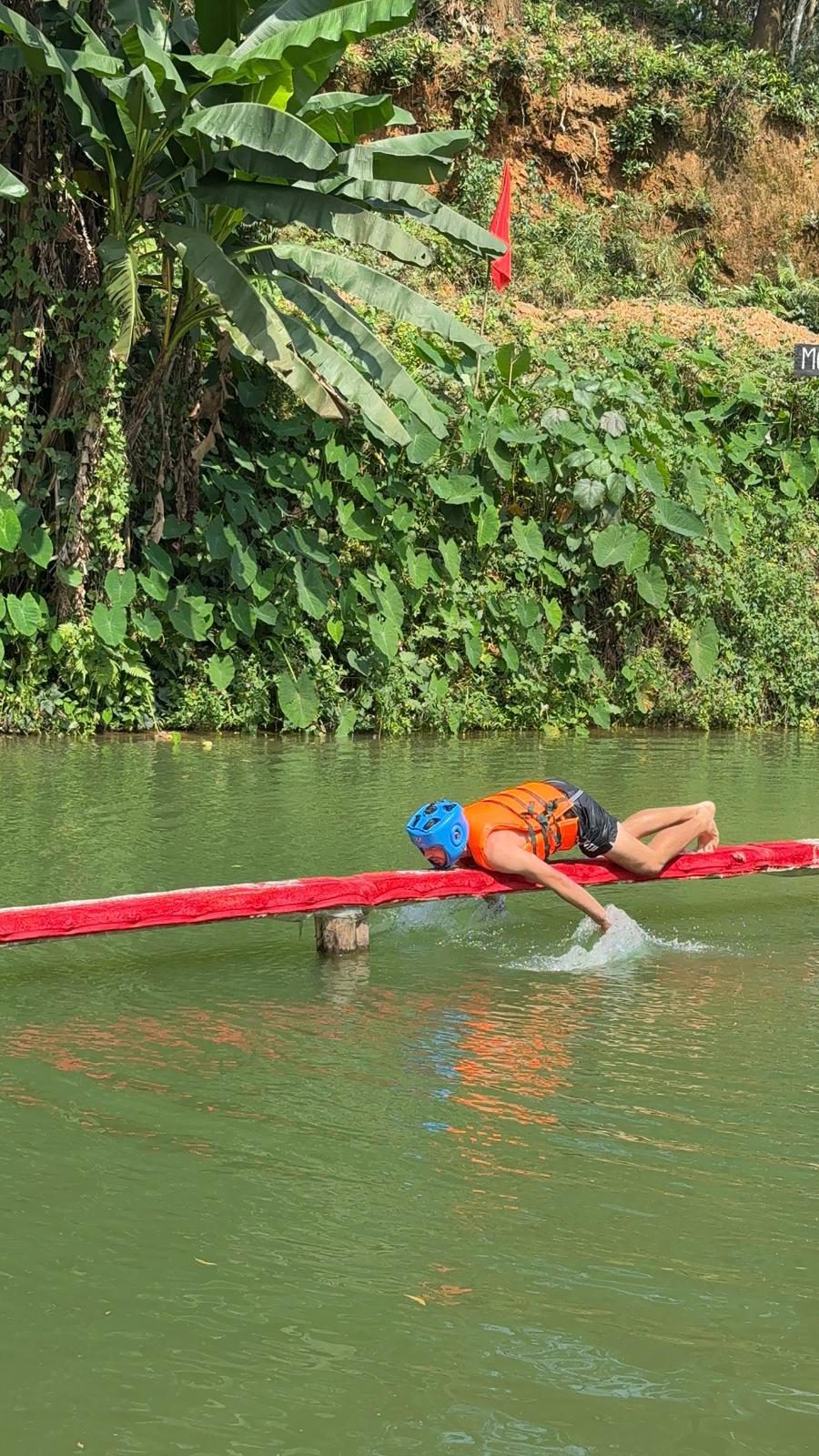 Floating down a green river past banana plants near Phong Nha, Vietnam